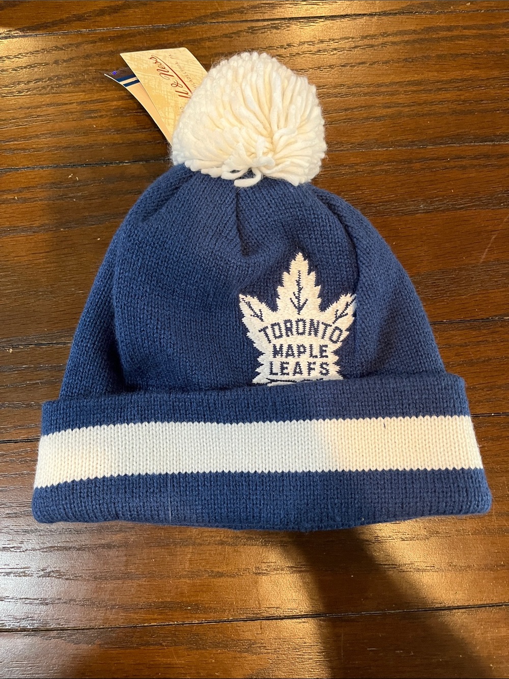 Mitchell & Ness Toronto Maple Leafs Navy and White Pom Cuffed Beanie